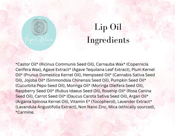 Lip oil ingredients list with a pink floral background