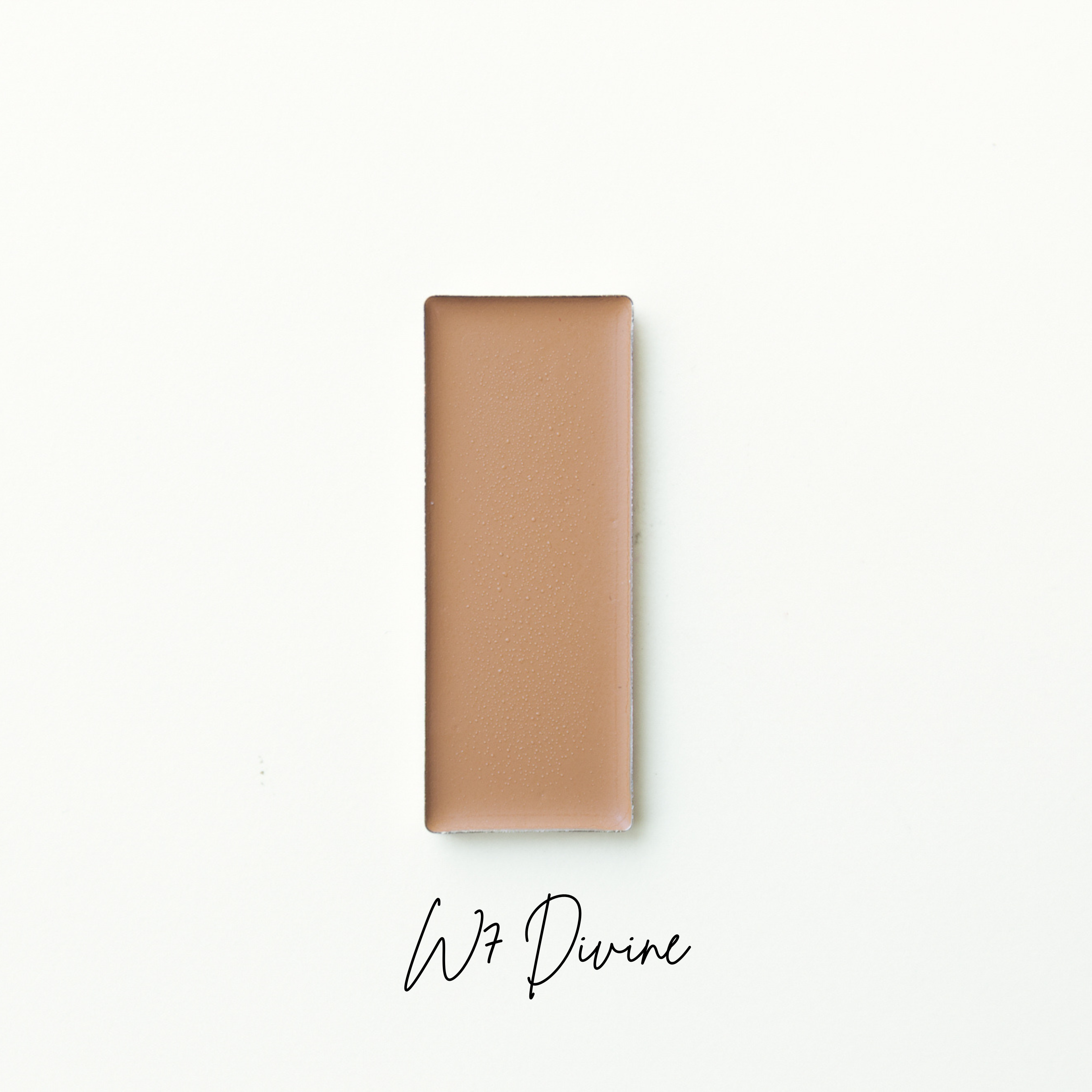 Rectangular brown product on a white background with 'W7 Divine' text. natural makeup