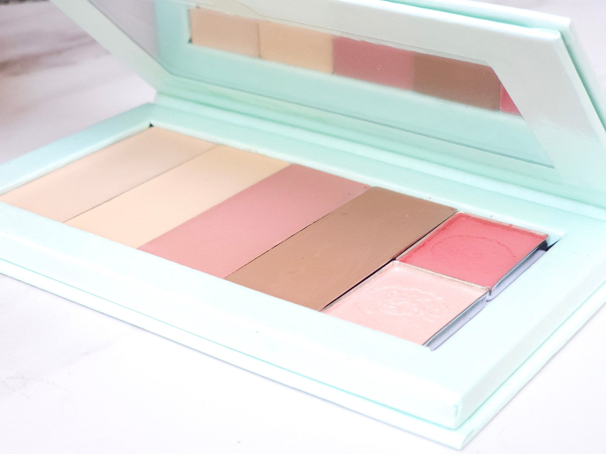 All-in-one teen makeup palette with eyeshadow, blush, and lip shades